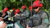 Taiwanese soldiers handle their guns during an anti-landing defense drill in New Taipei City.