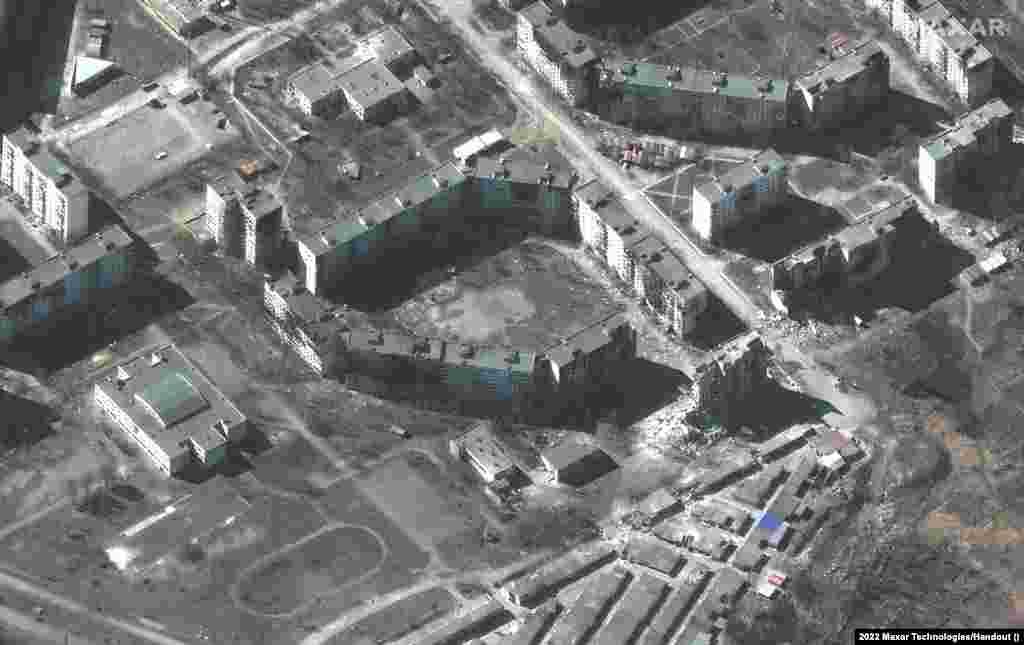 Разрушения жилых домов Мариуполя в результате российских обстрелов и бомбардировок. Maxar Technologies, 22 марта 2022 года
