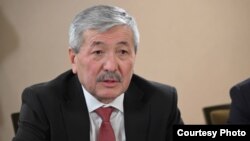 Адылбек Касымалиев.