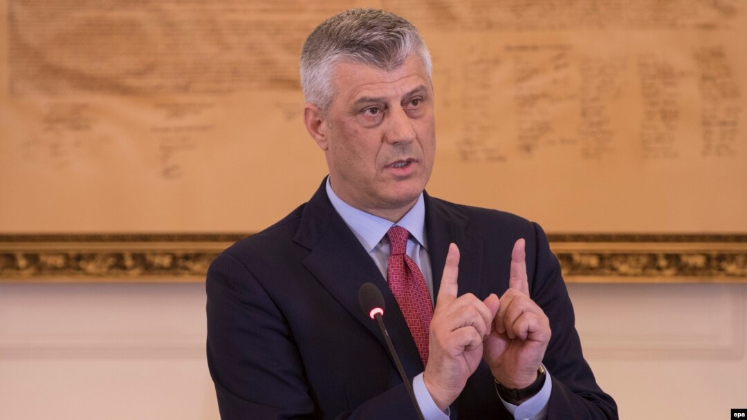 Kosovar President Hashim Thaci gestures during a press conference of his cabinet in Pristina on March 8, 2017.