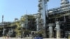 Türkmenbaşynyň nebiti gaýtadan işleýän zawodlar toplumy. Türkmenistanyň Nebitgaz toplumynyň elektron gazetinden alnan surat