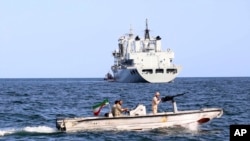 An Iranian military boat patrols as a warship enters Iranian waters prior to start of a joint naval drill between Iran, Russia, and China in the Indian Ocean. (file photo)