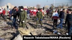 نمایی از محل سرنگونی هواپیمای اوکراینی در حومه تهران.