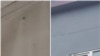 Armenia - Photographs released by the Defense Ministry show bullet holes on a building in Khnatsakh village, April 14, 2025.