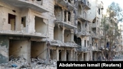 Разрушенные здания в Алеппо