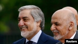 FILE: Ashraf Ghani (R) partnered with Chief Executive Abdullah Abdullah in the National Unity Government.