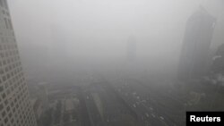مرکز تجاری پکن، پایتخت چین؛ نرخ مرگ و میر ناشی از آلودگی هوا در آسیای جنوب شرقی به نسبت دیگر مناطق جهان بسیار بالاست.