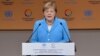 Putin, Merkel Agree To Coordinate Syria Peace Efforts Amid U.S. Troop Pullout