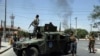 Afghan security forces arrive at the site of a bomb attack in Kabul on July 1. 