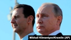 Орусия жана Сирия президенттери Владмир Путин менен Башар Асад.