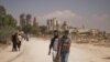 Heavy Fighting Reported In Tripoli As Qaddafi Deputy Defects