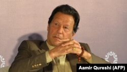 Pakistani Prime Minister Imran Khan attends the Refugee Summit Islamabad to mark 40 years of hosting Afghan refugee in Islamabad, February 17, 2020