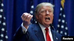 Владелец недвижимости и телеведущий Дональд Трамп официально объявляет о начале своей избирательной кампании борьбы за президентский пост в 2016 году во время мероприятия в Trump Tower в Нью-Йорке 16 июня 2015 года 