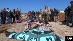 اجساد قربانیان حمله انتحاری روز جمعه در روستای سوسیان