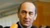 ARMENIA -- Then Armenian President Robert Kocharian talks to the media at a polling station in Yerevan, February 19, 2008