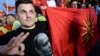 Учесник на протест на ВМРО-ДПМНЕ во маица со ликот на рускиот претседател Владимир Путин на 18 мај 2015 година во Скопје