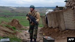 FILE: An Afghan Nation Army (ANA) soldier keeps watch during an operation in Bala Morghab district of Badghis Province (March 2017)