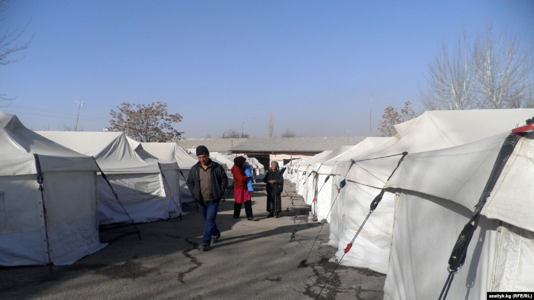 Residents of the village of Shark who lost their homes this summer still live in tents as temperatures drop.