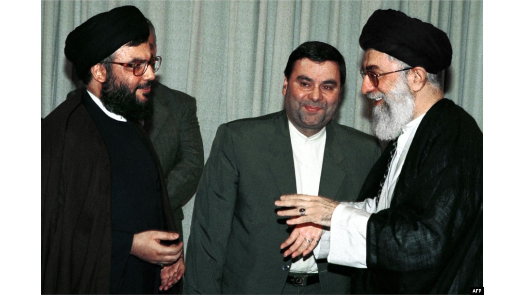 Iranian Supreme Leader Ayatollah Ali Khamenei (right) greets Hezbollah Secretary-General Hassan Nasrallah (left) at his office in Tehran in July 2000.