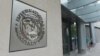 U.S. -- A sign at the entrance to the International Monetary Fund building in Washington.