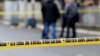 KOSOVO -- Police officers guard a scene where unknown assailants opened fire on Kosovo Serb politician Oliver Ivanovic in front of his office in the northern, Serb-dominated part of Mitrovica, January 16, 2018