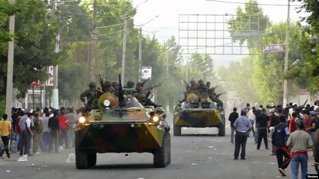 Armored vehicles patrol in Osh amid the rioting on June 11.