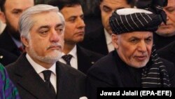 Afghan President Mohammad Ashraf Ghani (right) and Chief Executive Abdullah Abdullah have maintained a government together, barely.