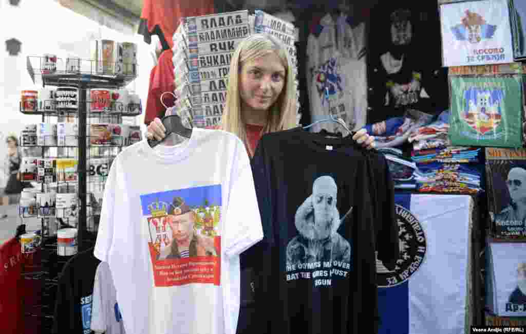 A choice of slogans: one T-shirt declares the gratitude of the Serbian nation to Putin, while the other says, "The Olympics May Be Over, But The Games Have Just Begun."