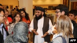 Taliban spokesman Suhhail Shaheen briefs journalists during Intra-Afghan Dialogue on July 8.