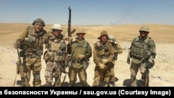 Сириядағы "Вагнер" жеке әскери тобының жалдамалы солдаттары.