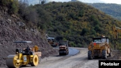 Armenia -- Workers refurbish a road in Syunik region.
